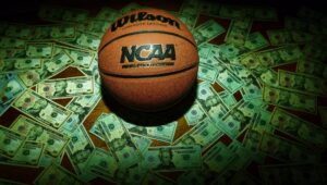 Eveleth, MN - USA - 03-08-2022: An NCAA Final Four Edition basketball surrounded by money